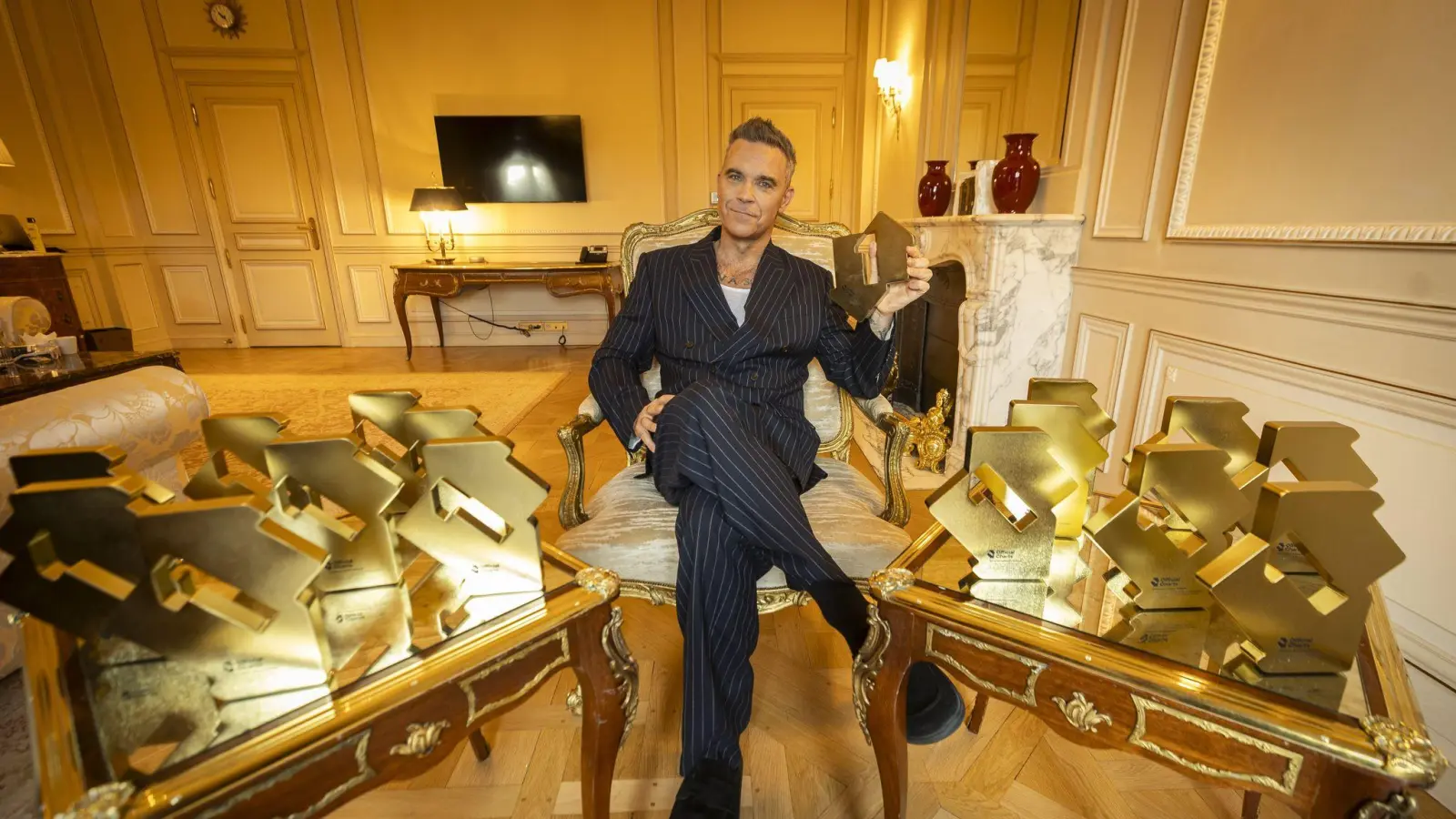 Niemand hat mehr Nummer-Eins-Plätze in den britischen Charts erreicht als Williams. (Bild: Official Charts Company/PA Media/dpa)